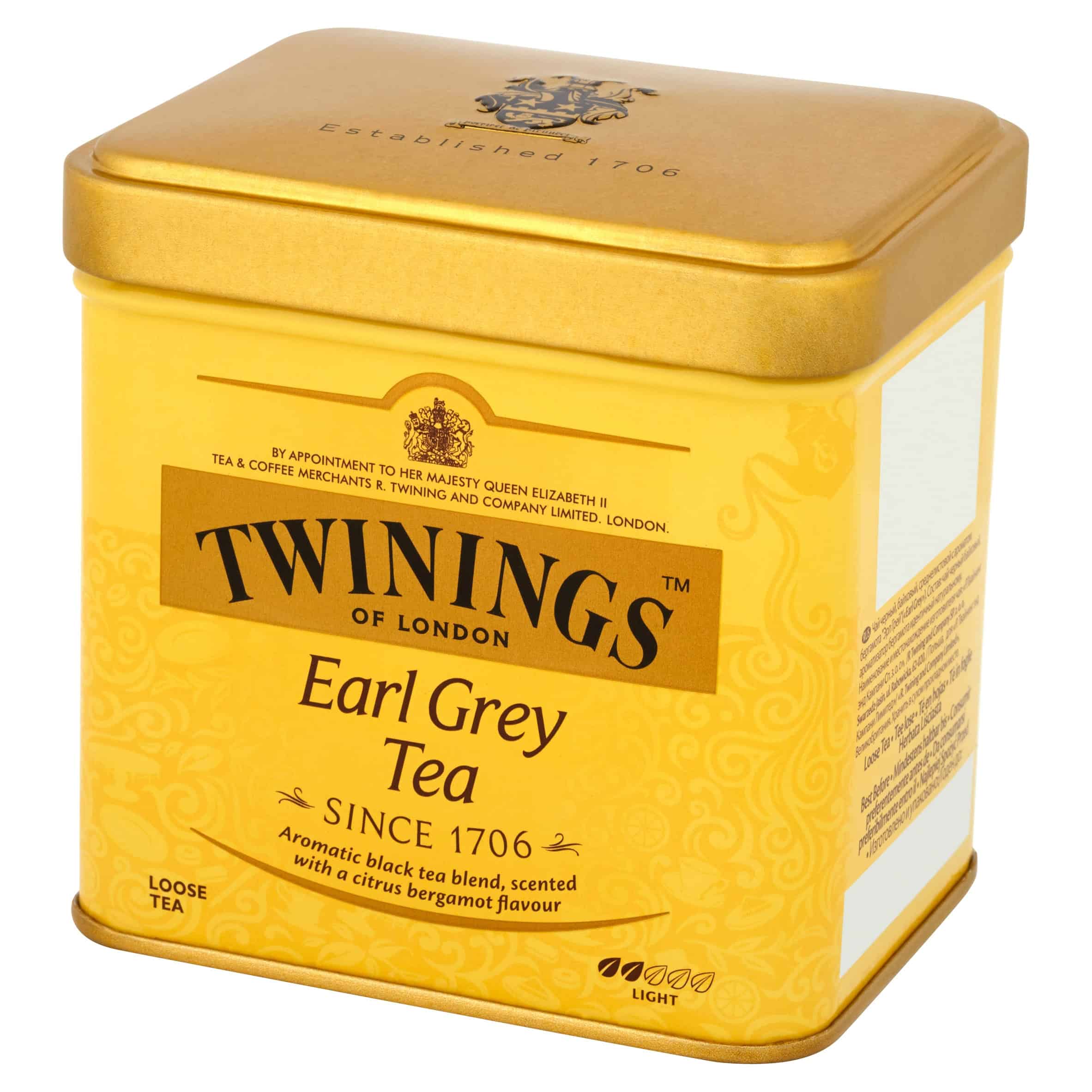Elegantne opakowanie herbaty Earl Grey od Twinings, złota metalowa puszka na herbatę w stylu klasycznym, idealne do przechowywania aromatycznej mieszanki czarnej herbaty z cytrusowym bergamotem.