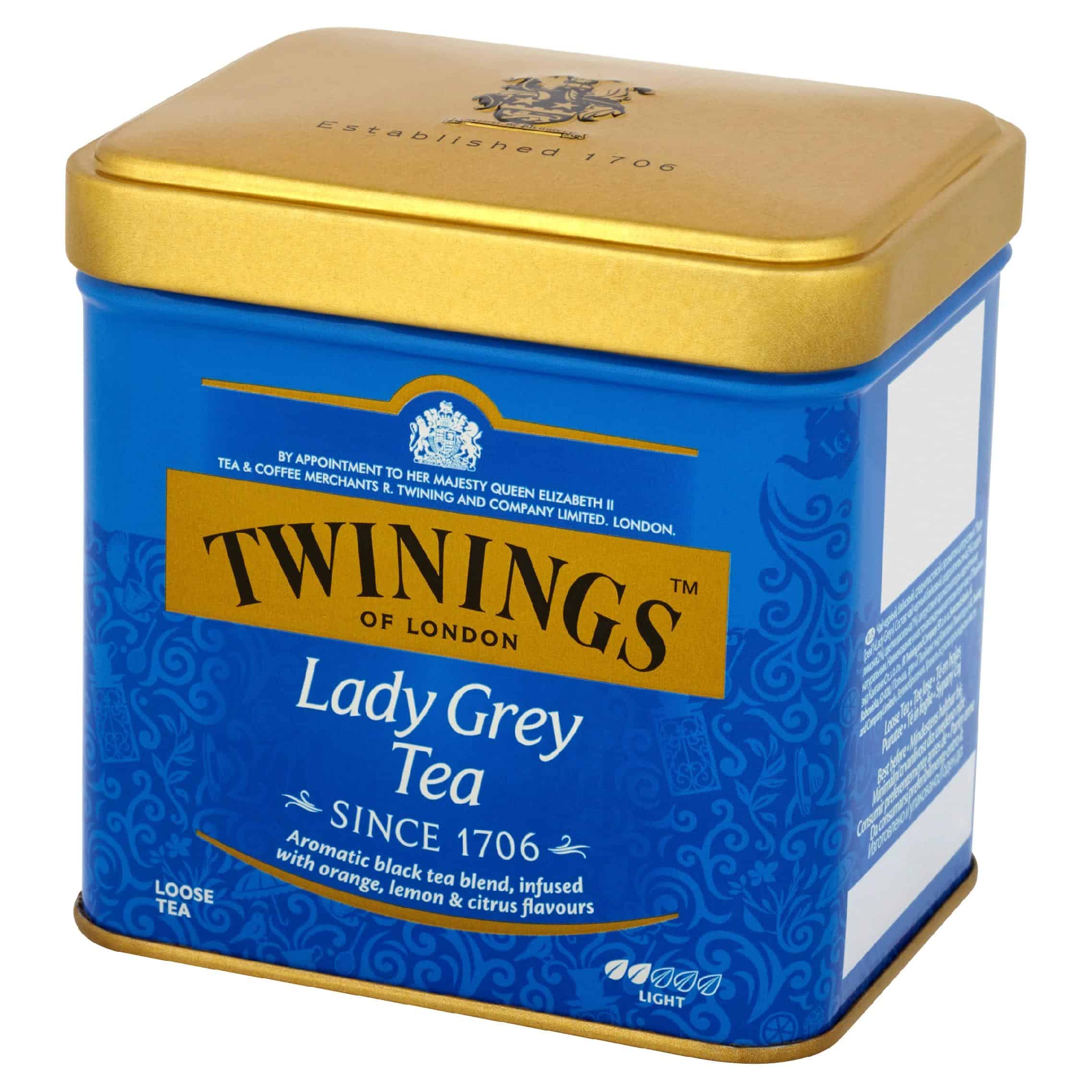 Czarna herbata Twinings Lady Grey w puszce, aromatyczna mieszanka herbaty z nutami pomarańczy, cytrusów i cytryny, idealna do filiżanki o lekkim smaku, produkcja od 1706 roku.