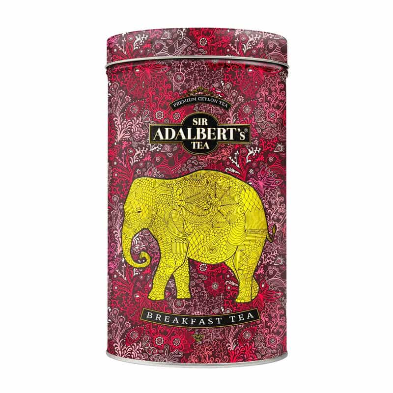 Aromatyczna herbata Adalbert's Tea Sir Adalbert's Breakfast Tea w eleganckim opakowaniu z kolorowym wzorem i sylwetką słonia, idealna na śniadanie, naturalne składniki, bogaty smak, wygodny pakiet.